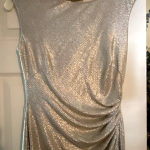 Beautiful Ralf Lauren Gown. Shimmer material with a scoop back very flattering